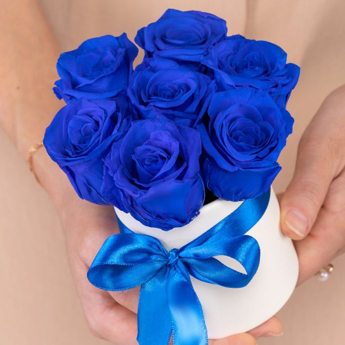 7 Blue Roses in a box stabilized